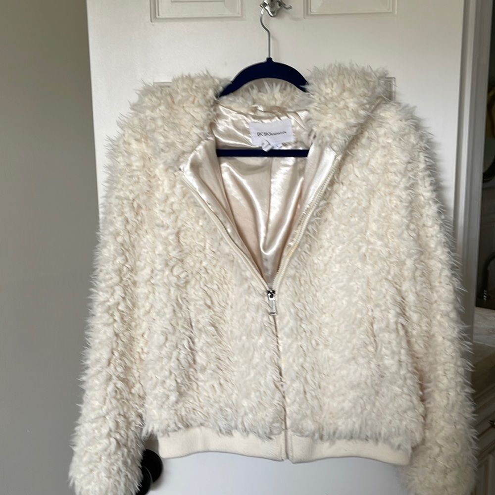 Fuzzy jacket with satin lining.